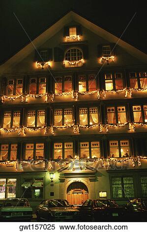 Stock Photography - Building lit up at night, Guild House Restaurant, Zurich, Switzerland. Fotosearch