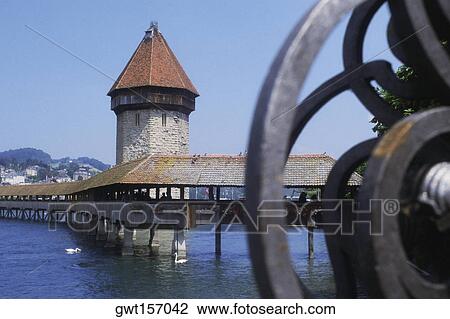 Covered bridge over a river, Lucerne, Switzerland View Large Photo Image Stock Image - Covered bridge over a river, Lucerne, Switzerland. Fotosearch