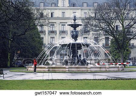 Fountain in front of a building, Geneva, Switzerland View Large Photo Image Stock Photo - Fountain in front of a building, Geneva, Switzerland. Fotosearch
