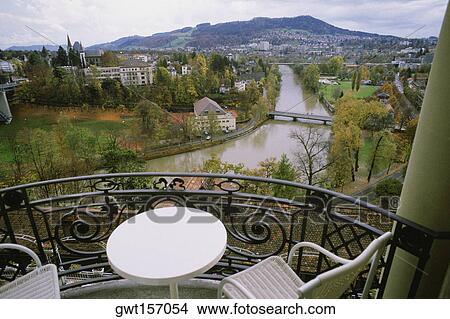 High angle view of a chair and a table in a balcony, Hotel Bellevue Palace, Berne, Berne Canton, Switzerland View Large Photo Image Picture - High angle view of a chair and a table in a balcony, Hotel Bellevue Palace, Berne, Berne Canton, Switzerland. Fotosearch