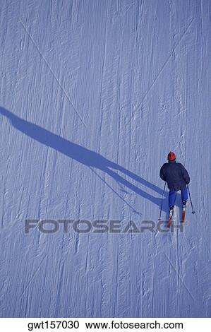 High angle view of a person skiing, Davos, Graubunden Canton, Switzerland View Large Photo Image Stock Image - High angle view of a person skiing, Davos, Graubunden Canton, Switzerland. Fotosearch