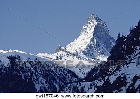 Low angle view of a snowcapped mountain, Matterhorn, Switzerland View Large Photo Image Stock Photograph - Low angle view of a snowcapped mountain, Matterhorn, Switzerland. Fotosearch