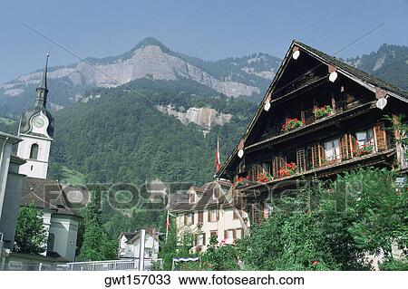 Low angle view of houses in a village, Vitznau, Switzerland View Large Photo Image Stock Image - Low angle view of houses in a village, Vitznau, Switzerland. Fotosearch
