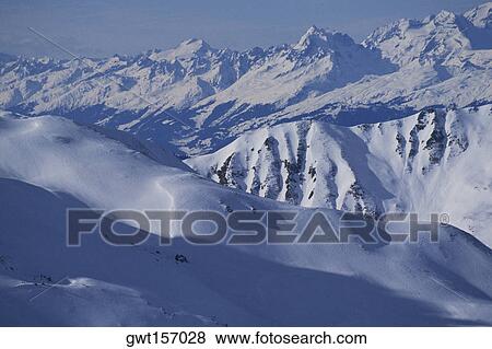 Stock Photo - Panoramic view of snowcapped mountains, Davos, Graubunden Canton, Switzerland. Fotosearch