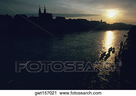 Silhouette of buildings at the waterfront, Rhine River, Basel, Switzerland View Large Photo Image Stock Image - Silhouette of buildings at the waterfront, Rhine River, Basel, Switzerland. Fotosearch