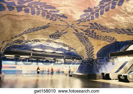 Group of people walking in a subway station, Stockholm, Sweden View Large Photo Image Stock Image - Group of people walking in a subway station, Stockholm, Sweden. Fotosearch