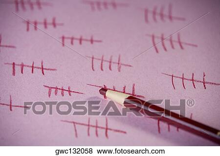 Close-up of a colored pencil on a sheet of paper View Large Photo Image Stock Photo - Close-up of a colored pencil on a sheet of paper. Fotosearch