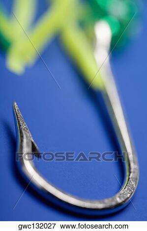 Close-up of a fishing hook View Large Photo Image Stock Photo - Close-up of a fishing hook. Fotosearch