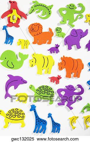Close-up of a group of multi-colored toy animals View Large Photo Image Stock Photography - Close-up of a group of multi-colored toy animals. Fotosearch