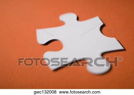 Stock Photo - Close-up of a jigsaw piece. Fotosearch