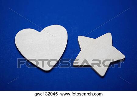 Close-up of a paper heart and a star View Large Photo Image Stock Photography - Close-up of a paper heart and a star. Fotosearch