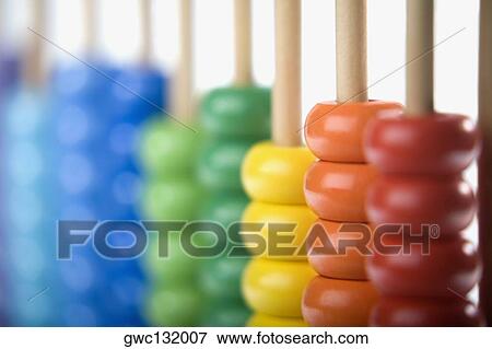 Close-up of an abacus View Large Photo Image Stock Photo - Close-up of an abacus. Fotosearch