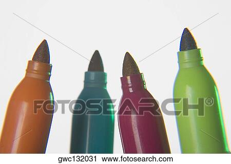 Stock Image - Close-up of four felt tip pens. Fotosearch
