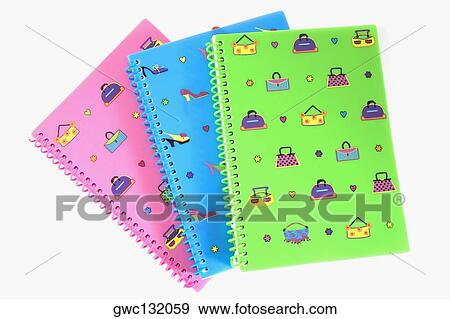 Close-up of three printed spiral notebooks View Large Photo Image Stock Photo - Close-up of three printed spiral notebooks. Fotosearch