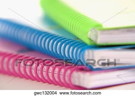 Close-up of three spiral notebooks View Large Photo Image Picture - Close-up of three spiral notebooks. Fotosearch