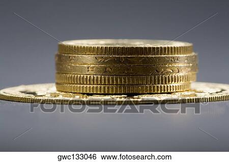Close-up of a stack of coins View Large Photo Image Stock Photograph - Close-up of a stack of coins. Fotosearch
