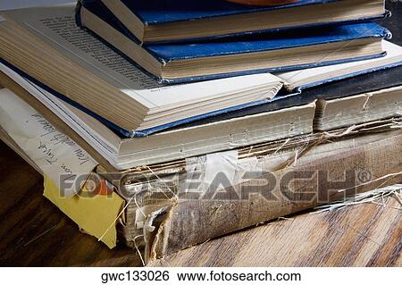 Close-up of a stack old books View Large Photo Image Stock Photograph - Close-up of a stack old books. Fotosearch