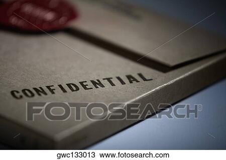 Stock Image - Close-up of a text on a file. Fotosearch