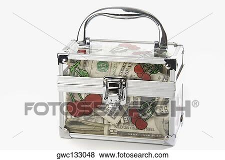 Close-up of a transparent box filled with paper currency View Large Photo Image Stock Photo - Close-up of a transparent box filled with paper currency. Fotosearch