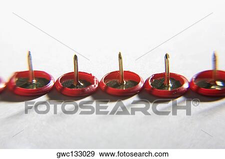 Close-up of five thumbtacks in a row View Large Photo Image Stock Photo - Close-up of five thumbtacks in a row. Fotosearch