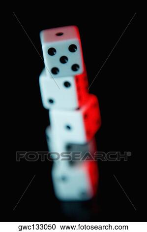 Close-up of four dice one on top of the other View Large Photo Image Stock Image - Close-up of four dice one on top of the other. Fotosearch