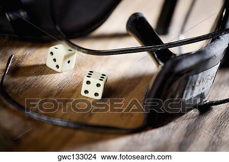 Close-up of high heel shoes with two dice View Large Photo Image Picture - Close-up of high heel shoes with two dice. Fotosearch