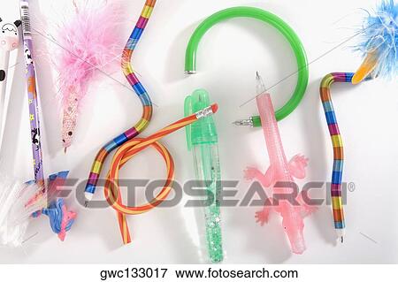 Stock Photo - Close-up of various pencils and pens. Fotosearch