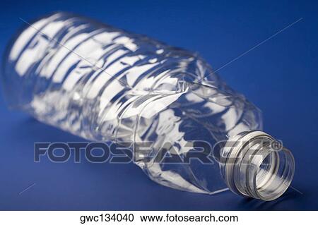 Close-up of a crushed plastic bottle View Large Photo Image Stock Image - Close-up of a crushed plastic bottle. Fotosearch