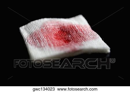 Close-up of a gauze with blood View Large Photo Image Stock Image - Close-up of a gauze with blood. Fotosearch