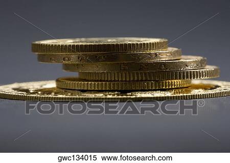 Close-up of a stack of coins View Large Photo Image Stock Photography - Close-up of a stack of coins. Fotosearch