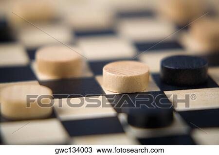 Stock Image - Close-up of checkers board. Fotosearch