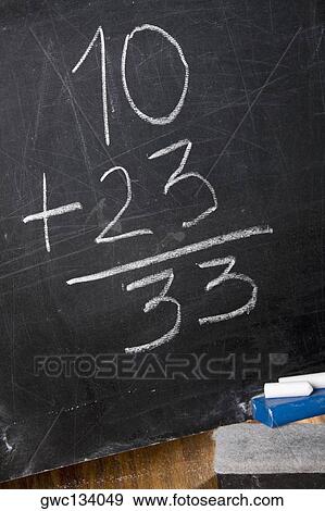 Stock Photo - Close-up of mathematical addition on a blackboard. Fotosearch