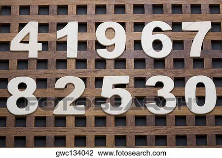 Close-up of numbers on a wood structure View Large Photo Image Stock Image - Close-up of numbers on a wood structure. Fotosearch