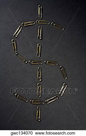 Close-up of paper clips in the shape of Dollar symbol View Large Photo Image Stock Image - Close-up of paper clips in the shape of Dollar symbol. Fotosearch