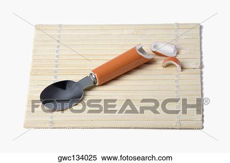 High angle view of a broken spoon on a mat View Large Photo Image Stock Photography - High angle view of a broken spoon on a mat. Fotosearch