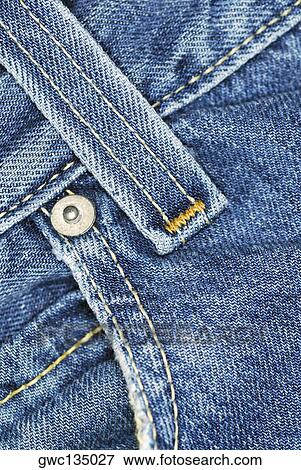 Close-up of a belt loop on a pair of jeans View Large Photo Image Stock Photo - Close-up of a belt loop on a pair of jeans. Fotosearch