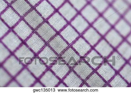 Stock Image - Close-up of a checked fabric. Fotosearch