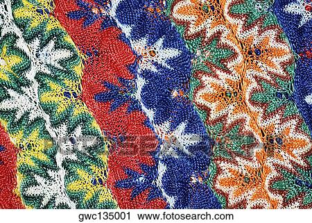 Stock Image - Close-up of a floral pattern on a woolen fabric. Fotosearch