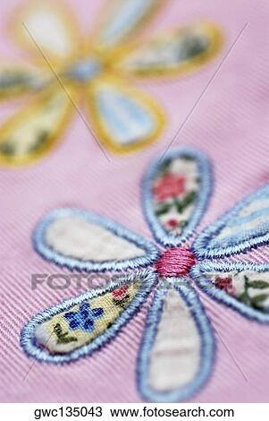 Close-up of a floral pattern on fabric View Large Photo Image Stock Image - Close-up of a floral pattern on fabric. Fotosearch