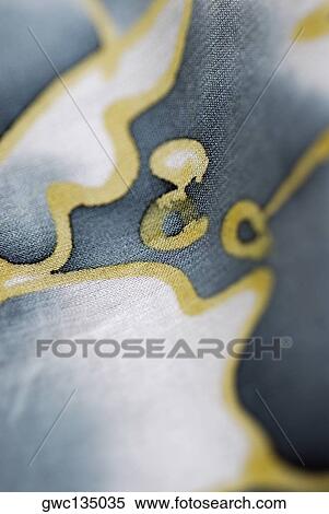 Close-up of a floral pattern on fabric View Large Photo Image Stock Photography - Close-up of a floral pattern on fabric. Fotosearch