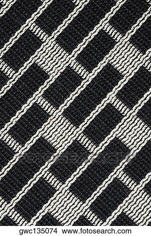 Close-up of a pattern on a mat View Large Photo Image Picture - Close-up of a pattern on a mat. Fotosearch