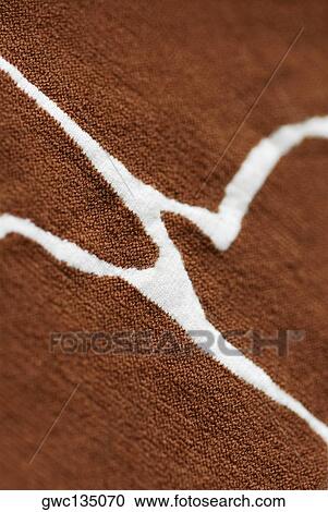 Stock Image - Close-up of a pattern on fabric. Fotosearch