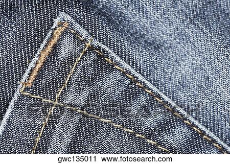 Stock Image - Close-up of a pocket on a pair of jeans. Fotosearch