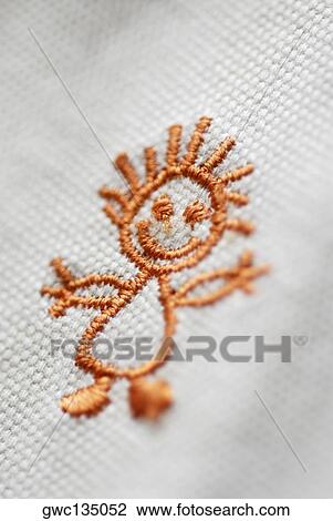 Close-up of an embroidery on fabric View Large Photo Image Stock Image - Close-up of an embroidery on fabric. Fotosearch