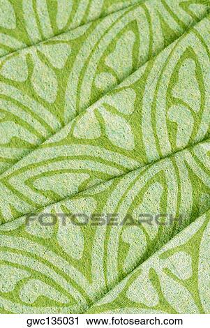 Stock Image - Close-up of folded fabrics. Fotosearch