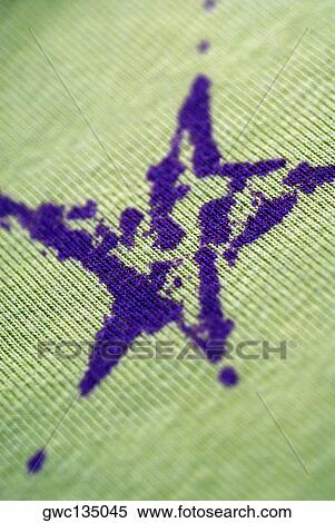 Close-up of star on a fabric View Large Photo Image Stock Photography - Close-up of star on a fabric. Fotosearch