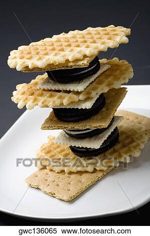 Close-up of a stack of waffles with crackers and cookies View Large Photo Image Stock Photography - Close-up of a stack of waffles with crackers and cookies. Fotosearch