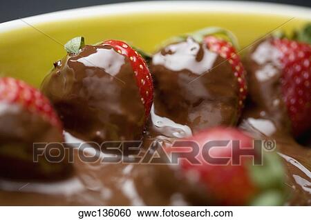 Close-up of chocolate covered strawberries in a bowl View Large Photo Image Stock Image - Close-up of chocolate covered strawberries in a bowl. Fotosearch