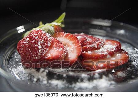 Close-up of sliced strawberries in a bowl View Large Photo Image Stock Image - Close-up of sliced strawberries in a bowl. Fotosearch