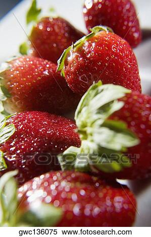 Close-up of strawberries View Large Photo Image Stock Photography - Close-up of strawberries. Fotosearch